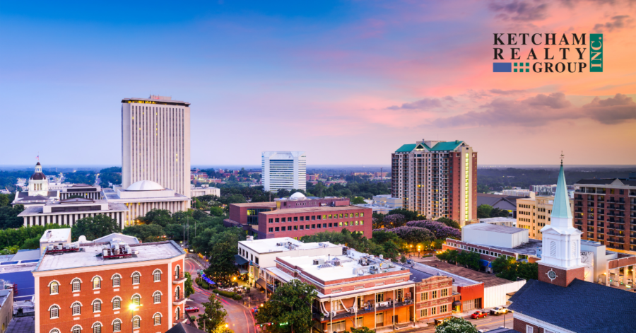 Daytime view of the Tallahassee skyline featuring the Ketcham Realty logo in the top right corner.